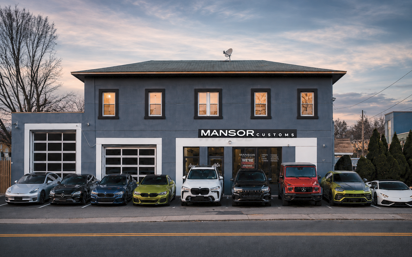 Mansor Customs shop in Garfield, New Jersey, with client cars lined up out front